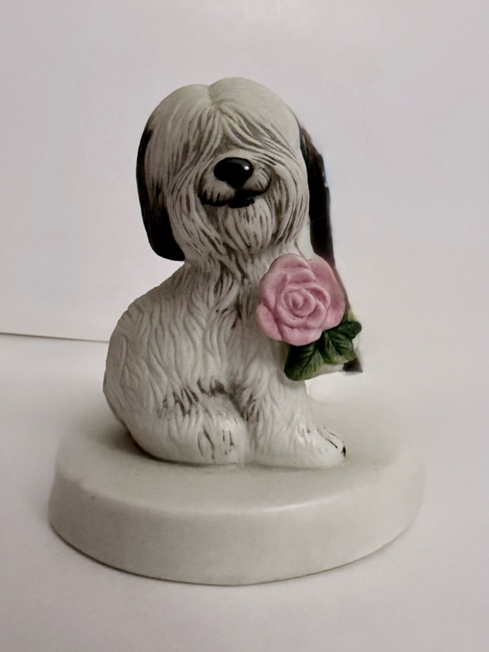 White Ceramic Dog Figurine with Pink Rose Accent